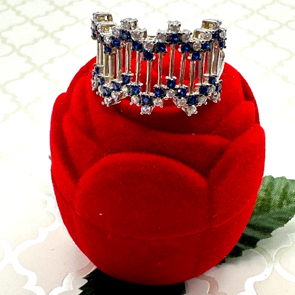 Splendid Sapphire & CZ Silver Ring atop its Red Rose Case
